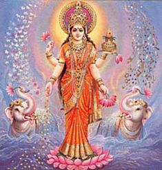 the hindu goddess standing in front of two elephants and an elephant with flowers on it