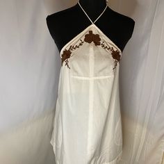 Free People Embroidered Pockets Halter Sun Dress Size L Nwot White Cotton Boho Sundress, Bohemian Embroidered Cotton Dress With Lace Trim, Bohemian Cotton Embroidered Dress With Lace Trim, Bohemian Cotton Mini Dress With Lace Trim, Spring Beach Embroidered Dress With Lace Trim, Embroidered Cotton Mini Dress For Vacation, Spring Embroidered Dress With Lace Trim For Beach, Beach Boho Cotton Dress Embroidered, Beach Embroidered Dress With Lace Trim