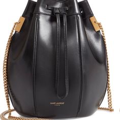 Saint Laurent Small Talitha Leather Bucket Bag. In Good, Used Condition. I Have Used Less Than A Handful Of Times. A Few Faint Scratches, But Not Too Noticeable. Authentic. “Subtle Logo Branding And A Polished Curb-Chain Strap Detail A Minimalist Bucket Bag Pieced From Panels Of Smooth Calfskin Leather.” - Drawstring Closure - Chain Strap - Flat Base - Color: Black - Made In Italy - Item # 5723260 Fit: 6”W X 9”H X 5.5”D Still On Nordstrom Website; Retail Price $1950. *No Dust Bag, No Box. Cheap Purses, Fall Handbags, Popular Handbags, Bold Logo, Bags Aesthetic, Leather Bucket Bag, Leather Bucket, Stylish Bag, Bag Women