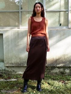 This minimalistic long skirt is a versatile piece that exudes elegance with its slim semi H-line silhouette and asymmetrical hemline detail.- Crafted from a luxurious wool blend fabric- With a matching belt for various styling options- Perfect for pairing with midi boots Fitted Brown Maxi Skirt For Workwear, Asymmetrical Maxi Skirt For Work In Fall, Fall Workwear Midi Wrap Skirt, Fall Midi Wrap Skirt For Workwear, Relaxed Wrap Skirt For Workwear In Fall, Fall Workwear Asymmetrical Wrap Skirt, Relaxed Fit Wrap Skirt For Workwear In Fall, Fall Wrap Skirt For Workwear, Chic Long Wool Skirt