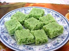 there are many pieces of green cake on the plate