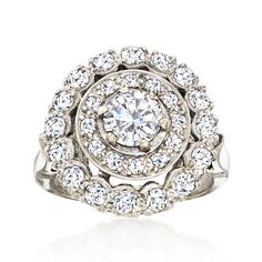 Ross-Simons - C. 1960 Vintage 1.70ct t. w. Diamond Cluster Ring in 14kt White Gold. Size 6.5. C. 1960. Hailing from the '60s era of fashion and brought to you by our own Estate collection, this cluster ring is a sight to see. Concentric circles bright with 1.05 ct. t. w. round diamonds form a step-style design - centered by a solitary and dazzling .65 carat round brilliant-cut diamond. Crafted in polished 14kt white gold, our ring emits gorgeous sparkle all over. 5/8" wide. Diamond cluster ring. Diamond Birthstone, Concentric Circles, Fine Jewelery, Jewelry Rings Diamond, Diamond Cluster Ring, Diamond Cluster, Vintage Diamond, Round Brilliant Cut Diamond, Cluster Ring