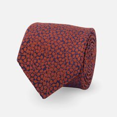 With its subdued pattern, our handmade Vine Floral Tie in rust is perfect for floral-curious types while still offering a trend-forward look. | Men's Tie Bar: Vine Floral Tie - Modern, In Rust, Silk Mens Silk Ties, Navy Tie, Neck Bow, Tie Pattern, Tie Men's, Rust Orange, Mens Neck Ties, Wedding Ties, Tie Bar