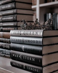 a stack of books sitting on top of a table