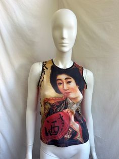 Vintage red tank top from Moschino Jeans. Geisha print on front and sequin trim details. Size I42 USA8 D38 tag, fits XS-S (see measurements ) Condition 9/10 (small hole) Made in Italy Underarm to underarm -  cm/"  Length from the back - cm/"  📍 follow the shop on Instagram: @𝚔𝚘𝚛𝚊𝚛𝚎_𝚟𝚒𝚗𝚝𝚊𝚐𝚎 All measurements taken with garment lying flat.  Vintage sizes vary greatly! We recommend comparing measurements with a similar style garment you own for best fit! If you have any other questions Fitted Graphic Print Camisole Top, Fitted Printed Tank Top, Y2k Sleeveless Printed Tops, Red Fitted Graphic Print Tank Top, Fitted Red Graphic Print Tank Top, Red Fitted Y2k Tank Top, Red Graphic Print Tank Top For Summer, Y2k Style Red Tank Tops, Fitted Tank Vest With Graphic Print