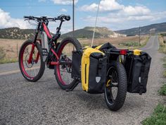 two bikes parked next to each other on the road