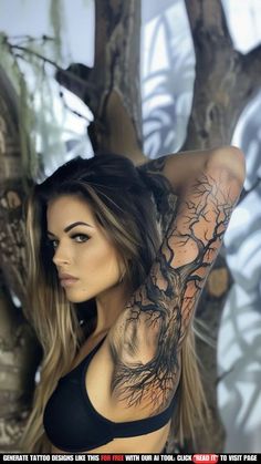 a beautiful woman with tattoos on her arm and chest standing in front of a tree