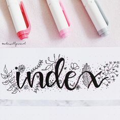 three markers with the word indexx written in black ink on top of a paper