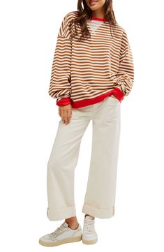 Zesty stripes lend nautical flair to a French terry sweatshirt fashioned in an oversized silhouette with bright ribbed contrasts. 28" length (size medium) Crewneck Long sleeves 66% cotton, 34% polyester Machine wash, tumble dry Made in the USA Oversized Sweatshirt Outfit, Stripe Sweatshirt, Striped Sweatshirts, Sweatshirt Outfit, Fall Fits, Oversized Pullover, Summer Fashion Outfits, Oversized Sweatshirt, Cotton Sweater