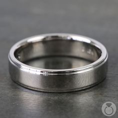 a wedding ring sitting on top of a table