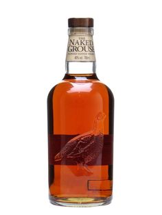 a bottle of naked grouse with a turtle on it's back and label