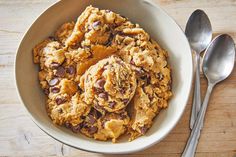 a bowl filled with cookies and chocolate chips