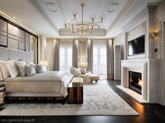 a bedroom with a large bed and fireplace in it