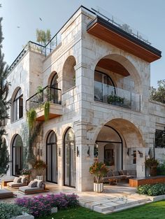 a large white building with lots of windows and balconies