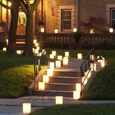 lighted steps leading up to a house at night