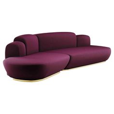 a purple couch sitting on top of a white floor