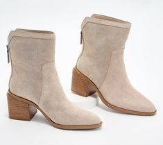 Now that boot season is finally here, it's time to step up your style game in a pair of suede stunners that are bound to become your new fave pair. Why? We can think of a few reasons:  A mid-shaft height is versatile enough to wear with the latest denim, leggings, skirts, and dresses. An understated back zipper provides easy entry and undeniable style. A stacked heel is totally walkable (and right on trend). Water-repellant suede(!!) is fashioned in rich hues that fit right in with your winter c