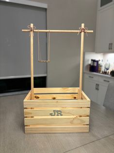 a wooden box sitting on top of a kitchen counter