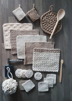 crocheted items are laid out on the floor