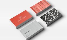 four different business cards on top of each other, with the same color and pattern