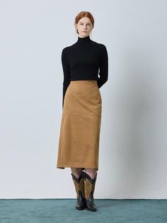 This luxurious suede H-line skirt in camel features elegant seam lines and thoughtful stitching details, complete with a practical back slit for ease of movement. The versatile piece can be perfectly paired with its matching jacket (C244PSF513) to create a sophisticated coordinated ensemble. Crafted from a premium polyester-polyurethane blend with a full polyester lining, this skirt offers both style and comfort in sizes 55 and 66, with a flattering midi length of approximately 82cm.Country of O Olive Skin, Stitching Details, Line Skirt, Jeans Style, Midi Length, Dream Closet, Camel, Midi Skirt, Moon