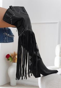 Slide into Montana and feel the power of modern-day cowboy boots. Features a thigh-high silhouette with charming studs and long fringe trim. You'll be the superstar wherever you are in these Western-inspired boots. pointy toe. embellishments. block heels. cowboy boots. padded insole. recommended size up for best fit.  thick thigh friendly. Fringe Cowboy Boots, Country Vibes, White Platform Sandals, Hippie Boots, Black Cowgirl, Black Cowboy Boots, Black Thigh High, Black Cowboy, Western Boots Women