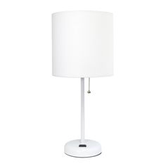 a white table lamp with a white shade on the base and a chain hanging from it's end