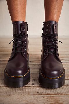 **Fit Note:** If in between whole sizes, we recommend sizing down. The original Dr. Martens 8-eye boot is reimagined with a bold chunky platform but stays true to the classic style featuring an iconic rubber air-cushioned sole and yellow stitching. * Smooth leather * Grooved sides * Side zipper closure * Goodyear Welt design, upper and sole are sewn together * Slip resistant | Dr. Martens Jadon Lace-Up Boots at Free People in Red, Size: US 9 Dr Martens Jadon, Doc Martens Boots, Shoe Inspo, Swag Shoes, Dr Martens Shoes, Carrie Bradshaw, Chunky Platform, Goodyear Welt, Pretty Shoes