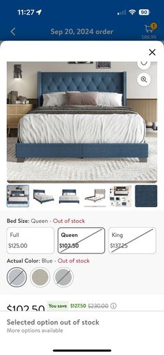 a bed with blue upholstered headboard and foot board is on the sale page