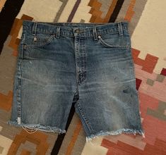 "Amazing worn in perfectly cutoff Levi's denim shorts. These are 517's with the orange tab. I'm guessing they are late 70's or early 80's. They have a zipper fly front.  There are worn in and there are some blemishes on one leg. Bottoms were cut off. NO real holes or tears though. Nice ones! Waist is a 36.  Measurements: Waist: about 36\" Rise: about 11\" Inseam: about 8\"  Outside leg: about 18\"" Cutoff Jeans, Levis Denim Shorts, Cutoff Jean Shorts, Denim Cutoffs, Levis Denim, Short En Jean, Jeans Shorts, Cut Off, Jean Shorts