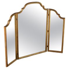 a mirror that is sitting on top of a table