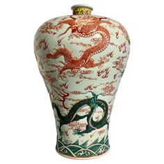 A large and powerful Chinese famille rose enameled porcelain "Five Dragon" meiping vase, modern, China. The oversized vase of traditional meiping form, with a splayed foot supporting a baluster shaped body with high shoulders, short, narrow neck, and rolled mouth rim. The large vase decorated with five dragons molded in relief. Their bodies painted in vibrant overglaze famille rose enamels of reds, greens, yellows and turquoise. The dragons portrayed dancing in the sky among flames and clouds. T Chinese Porcelain Pattern, Oversized Vase, Dancing In The Sky, Vase Modern, Contemporary Vases, Dragon Dance, Chinese Pottery, Chinese Vase, Pottery Marks