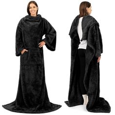 two women in robes standing next to each other, one wearing a black robe and the other wears a white t - shirt