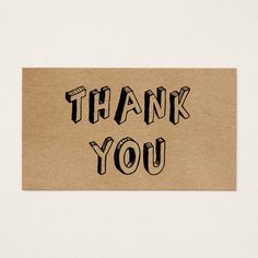 a thank card with the words thank you written on it in black and brown ink