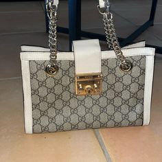 Beige Cream Authentic Gucci Padlock Small Shoulder Bag Purse With Gold Hardware There Are Signs Of Wear Throughout The Bag: Red Ink Inside Bag, Hardware Shows Sign Of Wear, Some Part Of The Beige/Cream Part Of The Bag Shows Marks **** Does Not Come With Key With Leather Holder (Not Pictured) Quick Shipping. Priced At $500 To Reassure For Authenticity, But Accepting Reasonable Offers Currently Retails For: $2300 Gucci Cream Shoulder Bag For Evening, Chic Beige Bag With Lock, Gucci Beige Shoulder Bag For Office, Elegant White Shoulder Bag With Cc Turnlock Closure, Chic Gucci Shoulder Bag With Cc Turnlock, White Bags With Lock For Everyday, Chic Gucci Shoulder Bag With Cc Turnlock Closure, Chic Gucci Shoulder Bag In Beige, White Gucci Bag For Formal Occasions