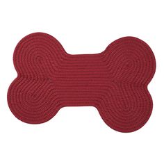 a red dog bone rug on a white background