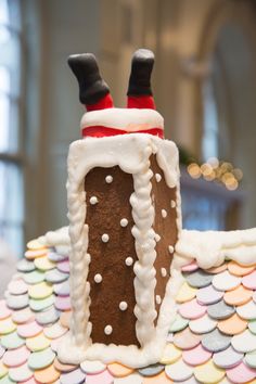 a cake with frosting and decorations on it