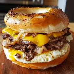 an egg, cheese and meat sandwich on a bagel