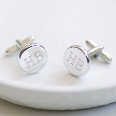 Simple, stylish cufflinks personalised with up to three bold initials. Choose initials which mean something to you - your name, your children's initials or perhaps yourself and your partner. The timeless design of these cufflinks means they'll be treasured for years to come, making them a popular gift for weddings, birthdays and graduations. They're also a favourite for Father's Day, engraved with the initials of your children. Your cufflinks will arrive in a smart grey cufflink box free of charge. To further personalise your order you can choose to add a chrome box, engraved with your words. Popular engravings include a personal message or favourite quote. The chrome box will arrive in a drawstring pouch free of charge. With both cufflink box styles, there's also the option to add a Carri Classic Personalized Round Cufflinks, Classic Round Personalized Cufflinks, Personalized Silver Cufflinks For Father's Day, Silver Cufflinks With Initials As A Gift, Silver Cufflinks For Father's Day Personalized Gift, Classic Personalized Initials Cufflinks, Personalized Classic Cufflinks For Anniversary, Classic Initials Cufflinks For Personalized Gift, Classic Personalized Cufflinks For Father's Day