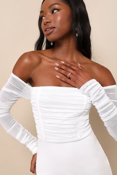 You're sure to be the center of attention any evening with the romance-ready look of the Lulus Elegant Eternity White Mesh Ruched Off-the-Shoulder Mini Dress! This trendy little number features stretchy sheer mesh (atop a matching knit liner) that shapes a ruched bodice and an off-the-shoulder neckline with hidden no-slip strips, all framed by long ruched sleeves. The high, fitted waist tops a crepe knit bodycon skirt that ends at a flirty mini hem. Hidden back zipper/clasp. Fit: This garment fi Center Of Attention, Lulu Fashion, Adhesive Bra, Bodycon Skirt, Ruched Bodice, White Mesh, Body Con Skirt, Strapless Bra, Bodycon Mini Dress