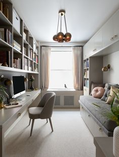 a living room filled with lots of furniture and bookshelves next to a window