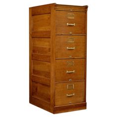 a tall wooden filing cabinet with five drawers