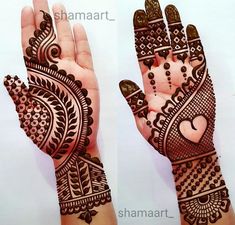 two hands with henna designs on them