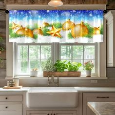 a kitchen window with christmas decorations on it