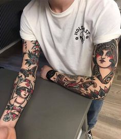 a man with tattoos on his arm is looking at the camera and has an instagram