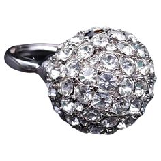 Elevate your evening attire with the Kenneth J Lane Disco Ball cocktail ring. This exquisite piece features a dazzling display of pave-set crystals that catch the light from every angle, reminiscent of a shimmering disco ball. Crafted in a sleek silver tone, the ring’s bold design makes a statement while maintaining an air of sophistication and elegance. Perfect for cocktail parties or any special occasion, this ring is sure to turn heads and spark conversations. Add a touch of glamour to your j Disco Ball Cocktail, Cocktail Parties, Timeless Accessories, Bold Design, Kenneth Jay Lane, Disco Ball, Evening Attire, Ring Silver, Cocktail Ring