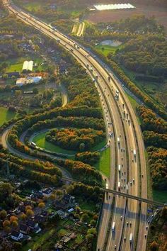 an aerial view of a highway with multiple lanes