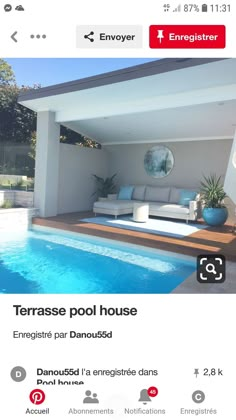 an image of a house with a pool in the middle and other things on it