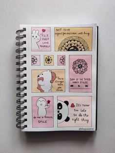 a spiral notebook with stickers on it and some writing in the bottom right corner