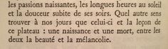 an open book with writing in french on the page and some type of text below it